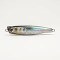 Foil mullet JigSkinz lure skin on a small stickbait, holographic finish, held in hand