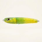 Mahi mahi pattern JigSkinz lure skin on a saltwater stickbait, side view on dark background