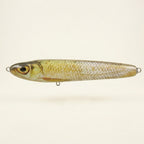 Golden shiner pattern JigSkinz lure skin on a stickbait, displayed on clear stand against dark background