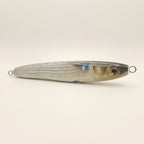 Mullet pattern JigSkinz lure skin on a saltwater stickbait, side view on dark background
