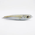 Cigar minnow pattern JigSkinz lure skin on a saltwater stickbait, side view on dark surface