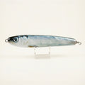 Herring pattern JigSkinz lure skin on a saltwater stickbait, displayed on clear stand against dark background
