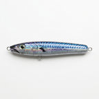 Foil mackerel JigSkinz lure skin on a topwater stickbait, holographic finish, on wooden table