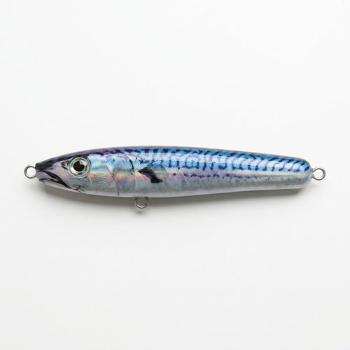 Foil mackerel JigSkinz lure skin on a topwater stickbait, holographic finish, on wooden table