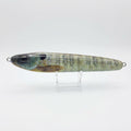 Bluegill pattern JigSkinz lure skin on a stickbait, displayed on clear stand against dark background